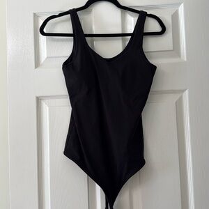 Klassy Network tank body suit with built in bra